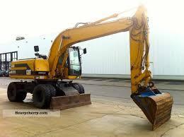 Escavatori gommati Caterpillar M 315 Mono