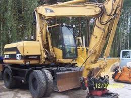 Escavatori gommati Caterpillar M 315 Mono