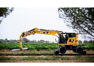 Escavatori gommati Caterpillar M323F 