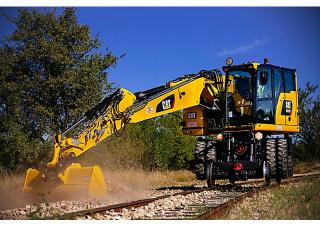 Escavatori gommati Caterpillar M323F 
