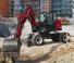 Escavatori gommati Yanmar B110W 