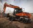 Escavatori gommati Doosan DX210W-5