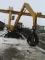 Escavatori gommati Caterpillar M 318 C MH