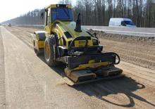 Compattatori stradali vibranti monotamburo Bomag BW 213 DH-4/P