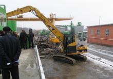 Escavatori cingolati Caterpillar 325 C MH