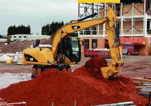 Escavatori gommati Caterpillar M313D