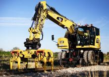 Escavatori gommati Caterpillar M323F 