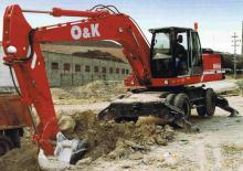 Escavatori gommati O&K MH 6