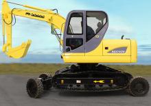 Escavatori gommati RHINO REX74CW