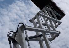 Piattaforme aeree verticali a pantografo su ruote Holland-Lift HL-190 E12 N