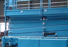 Piattaforme aeree verticali a pantografo su ruote Holland-Lift HL-330 E14